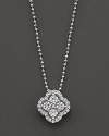 Diamond clover necklace in white gold.