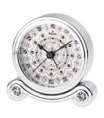 Sparkling crystals transform this bedside alarm clock from functional to fascinating. Chrome-finished metal case houses a white dial with hand-set pink and purple crystals and three black hands.