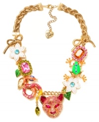 Turn on the charm with this funky frontal necklace from Betsey Johnson. Fabulously flaunts gold tone bows, tiger accented with pink-colored crystals, green frog with blue-colored crystals, pink and orange rectangular gems with crystal accents, green and gold tone leaves, snake with crystal accents and white flowers with crystal accents. Crafted in gold-plated mixed metal. Approximate length: 18 inches + 3-inch extender. Approximate drop: 1-3/4 inches.