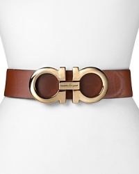 Sophisticated accessories are key to transforming your look, so invest in this reversible Salvatore Ferragamo belt, crafted of elegant leather. A bold buckle cinches this statement piece.