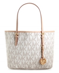 Jet set in style with this classic signature tote by MICHAEL Michael Kors. 18K goldtone hardware and a roomy interior give this travel-ready look a luxurious appeal in any time zone.