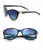 A feminine cat's-eye design is ultra-versatile and lightweight in acetate. Available in black with smoke gradient lens or flame blue with blue gradient lens. Metal logo plaque templesUV400 protectionMade in Italy 