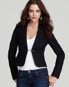 A slim cut and cropped silhouette infuse this Juicy Couture blazer with modern femininity. Slip the style over cocktail dresses for an element of surprise, or dress it down with jeans and a tee for everyday sophistication.