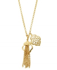 Culturally chic. This charming pendant from T Tahari's Essentials Collection combines three trendy styles in one. A tassel, an open-cut charm, and a filigree pendant create a striking look. Crafted in gold tone mixed metal. Base metal is nickel-free for sensitive skin. Approximate length: 30 inches + 3-inch extender. Approximate drops 1-1/2 inches, 1-1/2 inches. and 2-3/4 inches.