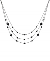 Add simple layers for a dynamic look. This stunning Monet illusion necklace features three graduated tiers of sparkling jet beads strung from a silver tone mixed metal setting. Approximate length: 18 inches + 2-inch extender.