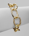 A glossy hammered design with large, statement links in 18k gold. 18k goldS-hook closureLength, about 7Made in Italy