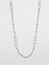 From the Dot Collection. This nature-inspired style from a socially and environmentally responsible brand features a sterling silver dot and hoop chain in a graduating design. Sterling silverLength, about 36Lobster clasp closureImported