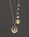 Diamonds and delicate charms on a 14K yellow gold chain. By Meira T.