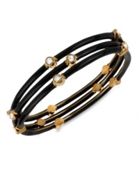 The power of three comes through in this bangle set from Kenneth Cole New York. Gold-tone mixed metal sets the foundation for these black bracelets, with glass crystal details added for luster. Approximate diameter: 2-1/2 inches.