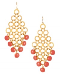 Warm color for the season. Kenneth Cole New York's gorgeous chandelier features linked rings with the addition of coral resin bead drops. Set in gold tone mixed metal. Approximate drop: 4 inches.