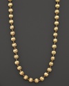 Hand engraved beaded necklace in 18K yellow gold from Marco Bicego's Africa collection.