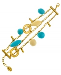 Add a little pop to your look. T Tahari's trendy three row bracelet combines polished metallic rings and bright turquoise and polished ivory resin beads in an antique gold tone mixed metal setting. Base metal is nickel-free for sensitive skin. Approximate length: 7-1/2 inches + 1-inch extender.