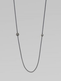 From the Starlight Collection. A long, lovely box chain of blackened sterling silver, punctuated by two spheres set with twinkling diamonds.Diamonds, .97 tcwSterling silverLength, about 36Lobster claspImported