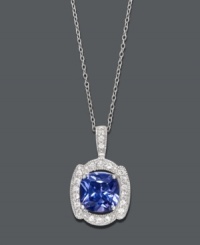 Steal the show with a little statement-making sparkle. B. Brilliant's stunning pendant highlights a Tanzanite-colored cubic zirconia  (7 ct. t.w.) encircled by sparkling clear cubic zirconias (5/8 ct. t.w.). Crafted in sterling silver. Approximate length: 18 inches. Approximate drop: 1 inch.