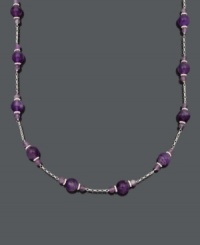 Perfect your look with a pop of regal color. Necklace features 60 carats of amethyst beads (4-5 mm and 9-10 mm) set in sterling silver with a tin-cup design. Approximate length: 18 inches.