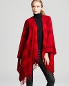 Bold red hues in an oversized Burberry check keep you warm and stylish.