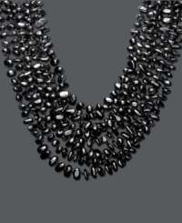 Let eight luxurious layers adorn your neckline. Silky onyx chips (6-8 mm) form eight graduated strands that make a bold, stylish statement. Approximate length: 18 inches.