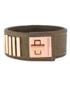 Lock up chic seasonal style! BCBGeneration's trendy turnlock cuff bracelet features neutrals and rosy hues in metallic bronze PVC and rose-gold tone mixed metal. Approximate length: 8-1/2 inches.