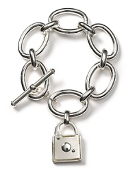 A classic locket charm adorns this gleaming silver-tone link bracelet from Lauren Ralph Lauren.