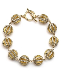 Burn bright with this Lauren Ralph Lauren bracelet which features a strand of gleaming beads, bedecked in cubic zirconia stones.