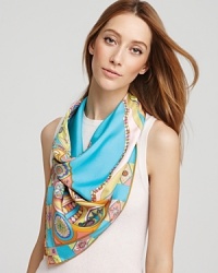 Add a little whimsy to your favorite ensemble with a silk twill scarf featuring a large multicolored butterfly, flowers and geometric shapes.