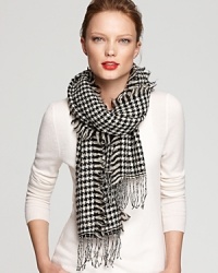 Lauren Ralph Lauren's affinity for combining classic style with modern details is embodied in this sequined houndstooth scarf.