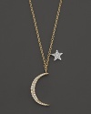 Dainty diamond-encrusted moon and star charm necklace from Meira T.