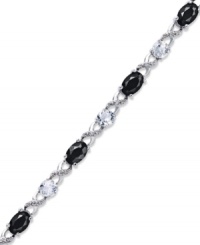 Embrace some glamour now and then. This pretty crisscross patterned bracelet highlights oval-cut onyx (3-1/3 ct. t.w.), round-cut white topaz (2-3/8 ct. t.w.) and sparkling diamond accents. Approximate length: 7-1/2 inches.