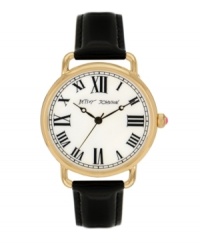 Betsey Johnson does the unexpected and sticks to tradition with this classic watch. Black patent leather strap and round polished gold tone stainless steel case. White dial features black Roman numerals, minute track, three hands and logo. Quartz movement. Water resistant to 30 meters. Two-year limited warranty.