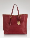 Designed with a timeless shape and sleek hardware, Longchamp's luxurious tote defines effortless day-right style.