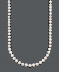 Layer yourself in three feet of glorious, polished pearls. This beautiful necklace by Belle de Mer features AA+ cultured freshwater pearls (11-12 mm) with a 14k gold clasp. Approximate length: 36 inches.