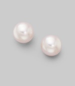 From the Akoya Collection. Classic white cultured pearl studs set in 18k gold. 8mm white round cultured pearls Quality: A 18k white gold Post back Imported