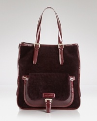 Unexpected details and contrasting textures update this classically styled tote from Longchamp.