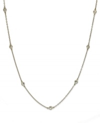 Inch by inch of luminous sparkle. B. Brilliant's delicate necklace features nine round-cut cubic zirconia stations (9/10 ct. t.w.) set in 18k gold over sterling silver. Approximate length: 20 inches.