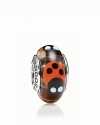 Lucky ladybugs adorn this colorful murano glass charm. Logo-engraved sterling silver trim displays the PANDORA signature.