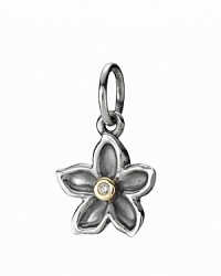 PANDORA's sterling silver daisy pendant centered by a sparkling bezel-set diamond in 14K gold.