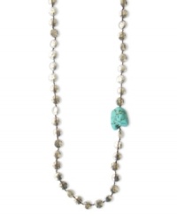 Chic and fashionable, this Lucky Brand necklace combines hammered coin accents with a single reconstituted turquoise nugget. Crafted in silver tone mixed metal. Approximate length: 36 inches.