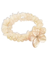 Prim petals. This pretty stretch bracelet combines three strands of pink cultured freshwater pearls (6-7 mm), pink shells and rose quartz (97-3/4 ct. t.w.) with a sweet flower accent. Set in sterling silver. Approximate length: 7-1/2 inches. Approximate diameter: 2 inches.