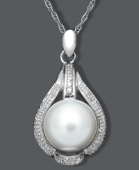 The perfect finishing touch. This elegant pendant features a chic, teardrop shape highlighting a cultured freshwater pearl (9-10 mm) and sparkling diamond accents. Set in sterling silver. Approximate length: 18 inches. Approximate drop: 1 inch.