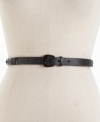 A slender, ultra-stylish studded leather belt by MICHAEL Michael Kors.