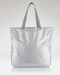 Practical style gets a touch of sparkle with this top handle tote from Le Sportsac. Roomy and ritzy, this day bag lives to lend standard-issue denim an of-the-moment edge.