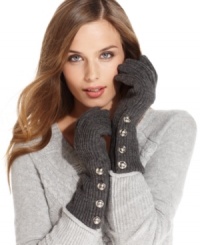 Be beautifully buttoned up this winter. Start with these chic knit gloves from MICHAEL Michael Kors that are adorned with signature-embossed snap buttons.