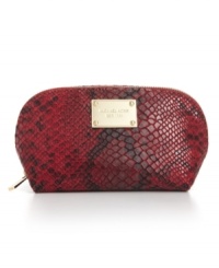 Revel in reptilian chic with this python-embossed cosmetic case from MICHAEL Michael Kors. Accented with signature detailing, it's sized-right to stow a bevy of beauty essentials.