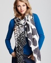 Sky's the limit in this DIANE von FURSTENBERG oblong scarf, printed with muted black floating clouds.