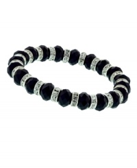 Black is the new black! Bedecked with jet and clear crystals, 2028's stretch bracelet is a timeless, versatile look you'll cherish. Crafted in silver tone mixed metal, it slips on and off with ease. Approximate diameter: 2-1/4 inches.