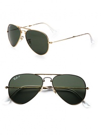 Classic metal aviator sunglasses fold to fit into your pocket. Available in gold with green crystal lens.Metal temples100% UV protectionMade in Italy 