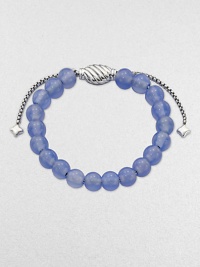 From the Spiritual Bead Collection. A simple strand of softly hued 8mm blue chalcedony beads on a sterling silver chain with an oval cable slide clasp.Blue chalcedonySterling silverDiameter, about 2Adjustable slide claspImported