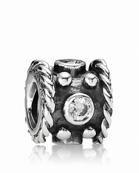 Oxidized silver brightens and highlights the cubic zirconia accents on this decorative PANDORA charm.