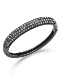 Sweet, contrasting colors play a standout part in your wardrobe. Charter Club's bold bangle features sparkling crystals that pop against a dark background. Crafted in hematite tone mixed metal. Approximate diameter: 2 inches.