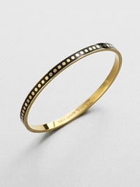 An enamel accented, 12k goldplated design with a hidden, engraved message. Enamel12K goldplated zincDiameter, about 2.5Slip-on styleImported 